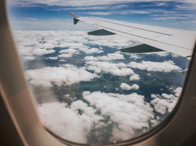 Плейлист для путешествия: что слушать в самолете